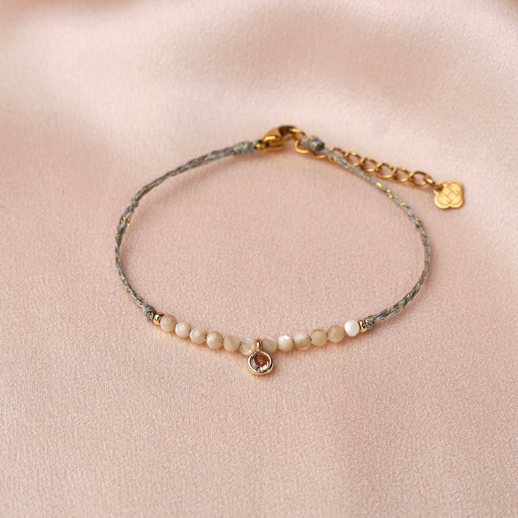 Pulsera Blanca. Perlas blancas y circonio rosa pálido