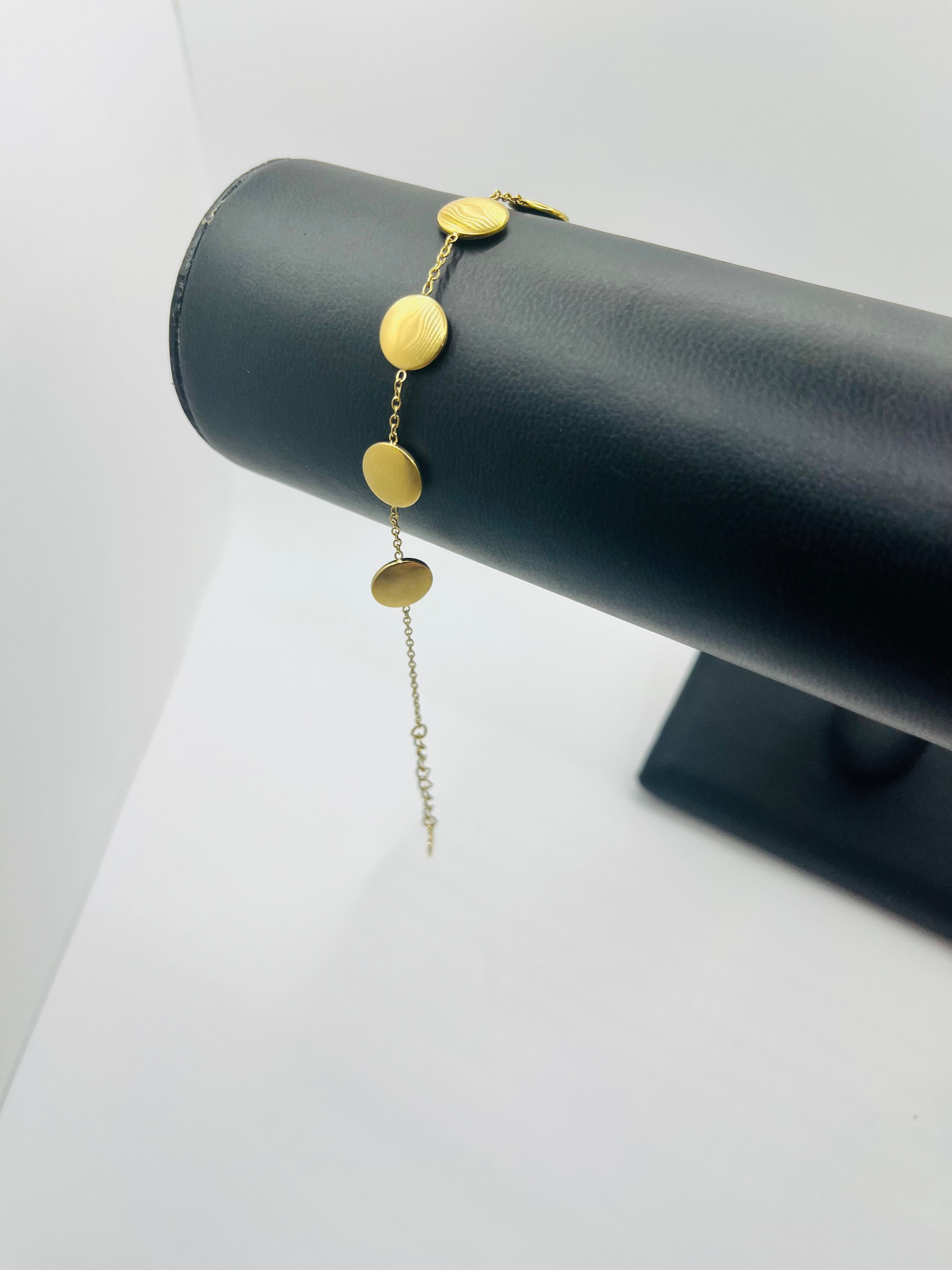 Pulsera Esfera. Acero inoxidable chapado en oro 14K